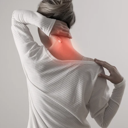 A woman with neck pain.