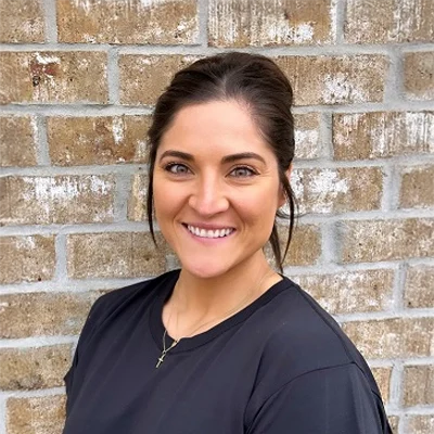 Chiropractic Huntsville AL Roxanne Roxanne smiling.