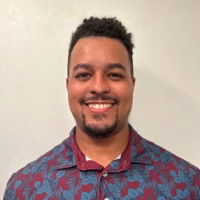 Dr. Andre McFarlane smiling.